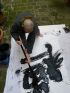Démonstration au grand pinceau, encre de Chine sur papier, 2010, 176 × 70 cm